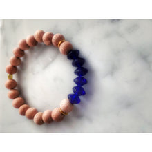 Load image into Gallery viewer, Deep Blue Vaseline Glass &amp; Rosewood with Gold Diffuser Bracelet